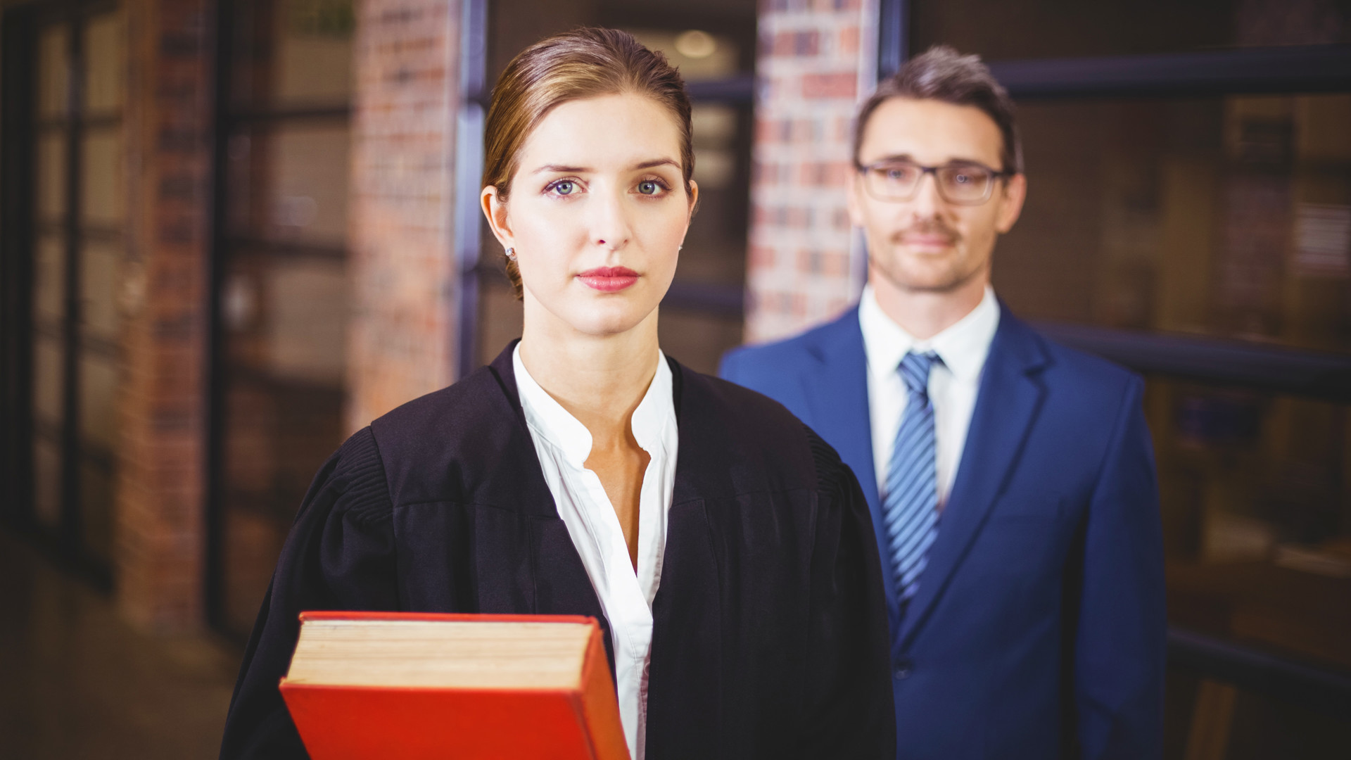 Female law student with book in hand